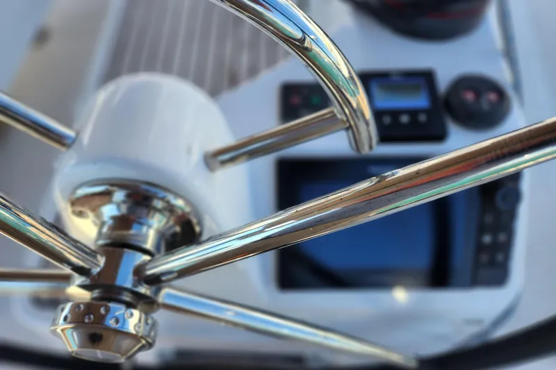 Slide: The Image of Close-up of Jeanneau Sun Odyssey 410 yacht steering wheel and navigation instruments, 2020 model. - 16