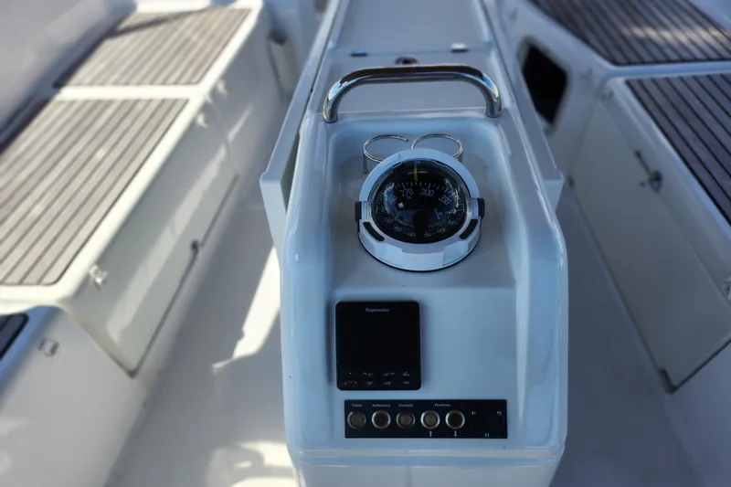 Slide: The Image of Cockpit controls of 2020 Jeanneau Sun Odyssey 410 sailboat, featuring navigation instruments. - 17