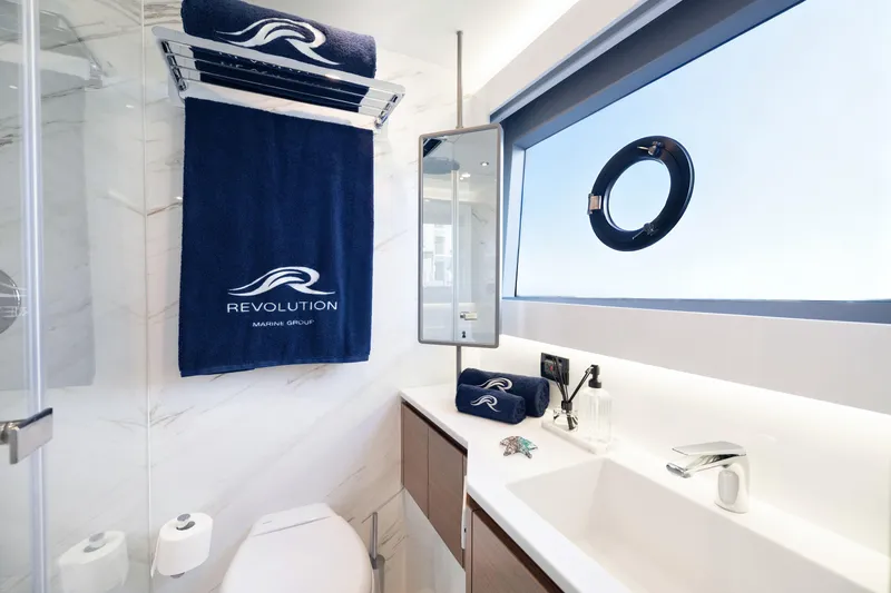 Slide: The Image of Luxurious bathroom in 2026 Oceanwalker S60e yacht with modern fixtures and ocean view. - 21