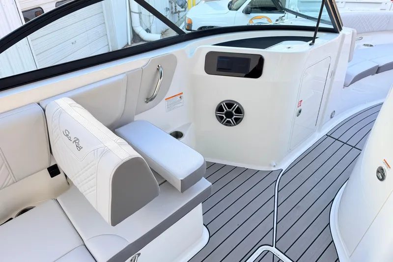 Slide: The Image of 2026 Sea Ray SDX 230 boat interior with sleek seating and modern design features. - 8