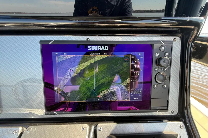 Slide: The Image of Simrad navigation display on 2018 ShearWater 23LTZ boat, showing map and data. - 10