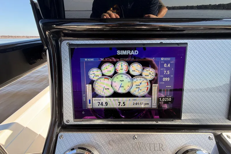 Slide: The Image of Simrad display on 2018 ShearWater 23LTZ boat showing navigation and engine data. - 11