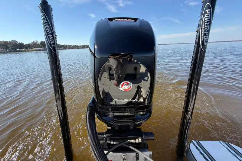 Slide: The Image of 2018 ShearWater 23LTZ boat engine on water with Power-Pole anchors. - 33