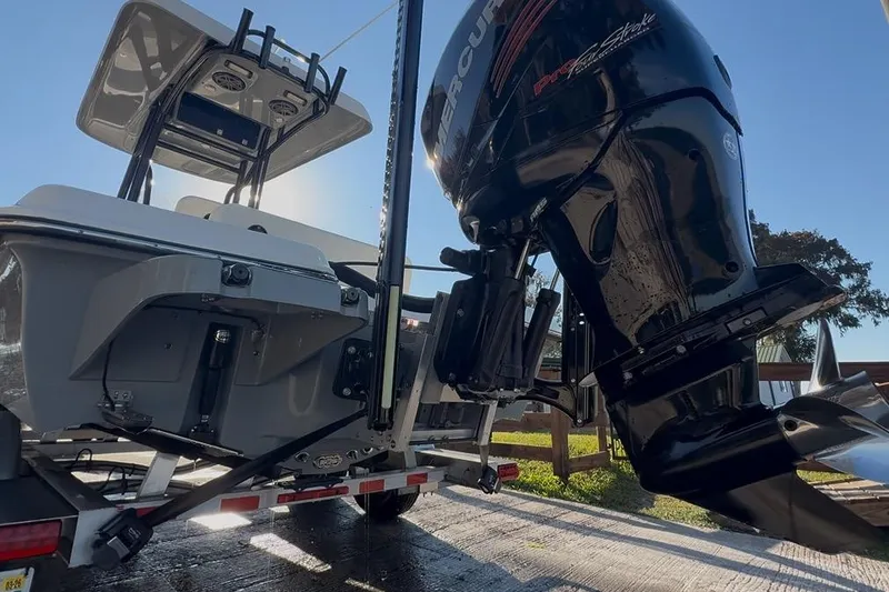 Slide: The Image of 2018 ShearWater 23LTZ boat with Mercury outboard engine on trailer. - 71