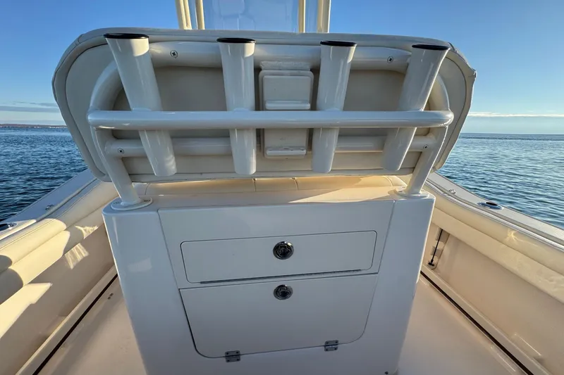 Slide: The Image of 2024 Grady-White Fisherman 216 boat interior with rod holders and storage. - 13