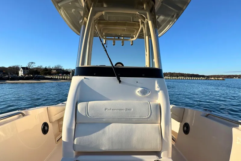 Slide: The Image of 2024 Grady-White Fisherman 216 boat on calm water, sunny day. - 22