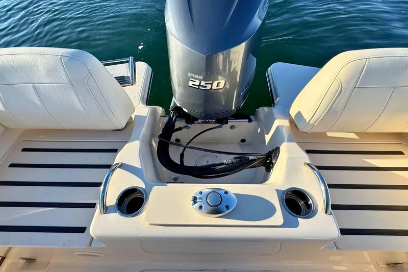 Slide: The Image of 2024 Grady-White Fisherman 216 boat with Yamaha 250 engine, rear seating view. - 9