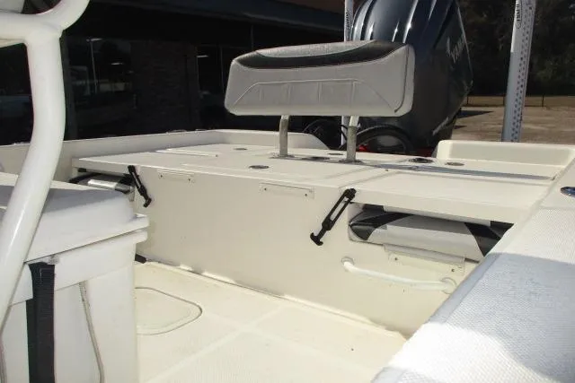 Slide: The Image of 2021 Skeeter SX240 boat interior with seating and storage compartments. - 6