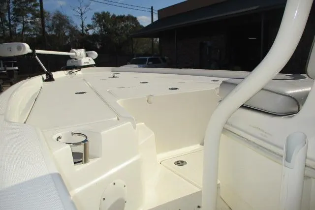 Slide: The Image of 2021 Skeeter SX240 boat deck with seating and fishing rod holders. - 7