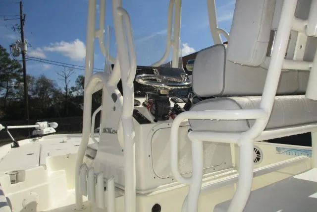 Slide: The Image of 2021 Skeeter SX240 boat interior with seating and control panel. - 8
