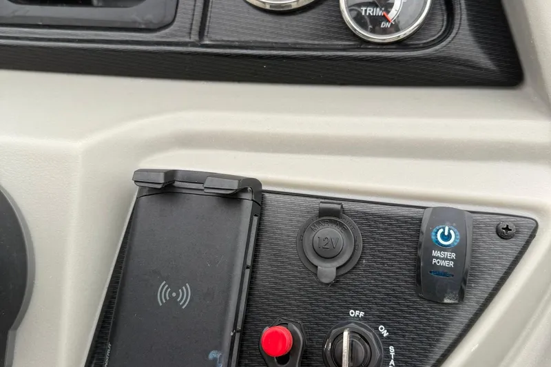 Slide: The Image of Control panel of 2025 Berkshire 24CL 2.75 LE with power switch and 12V outlet. - 13