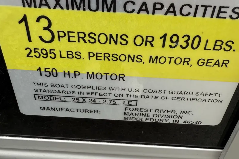 Slide: The Image of 2025 Berkshire 24CL 2.75 LE boat capacity label, 13 persons, 1930 lbs, 150 HP motor. - 15