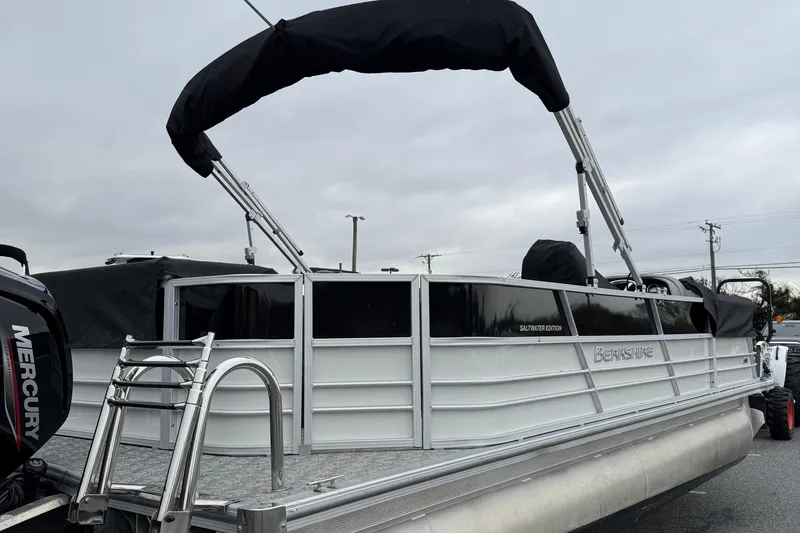 Slide: The Image of 2025 Berkshire 24CL 2.75 LE pontoon boat with Mercury engine, saltwater edition. - 5
