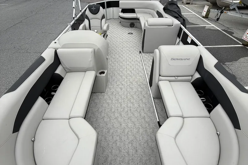 Slide: The Image of 2025 Berkshire 24CL 2.75 LE pontoon boat with spacious seating and modern design. - 6