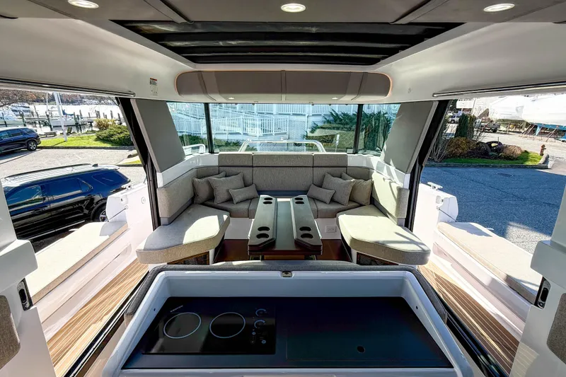 Slide: The Image of Luxurious interior of 2024 Axopar 45 XC Cross Cabin with modern seating and sleek design. - 11