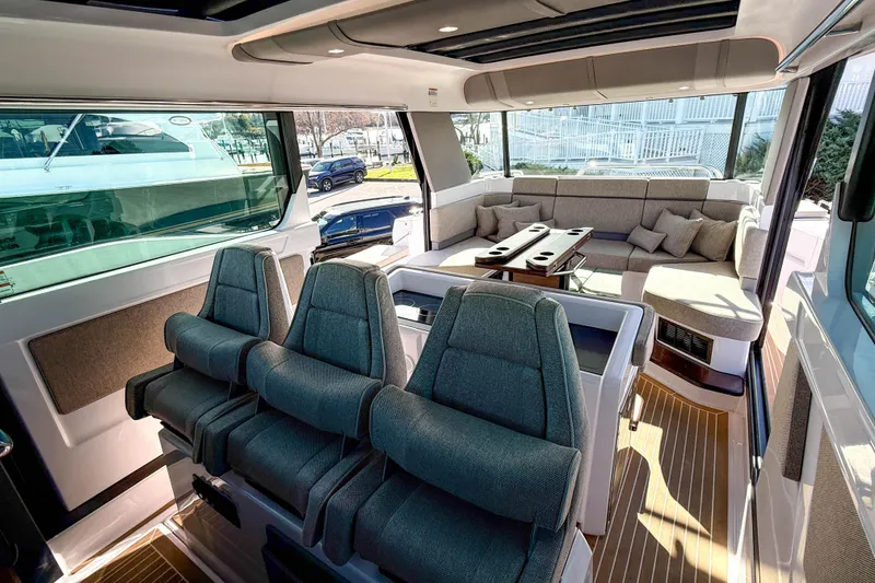Slide: The Image of Luxurious interior of 2024 Axopar 45 XC Cross Cabin with plush seating and modern design. - 13