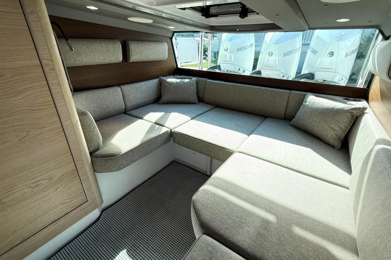 Slide: The Image of Luxurious interior of 2024 Axopar 45 XC Cross Cabin with comfortable seating and modern design. - 21
