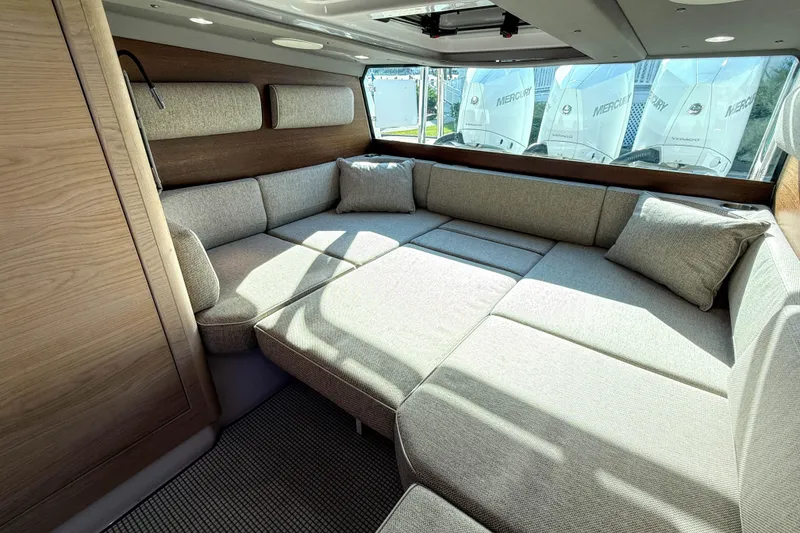 Slide: The Image of Luxurious interior of 2024 Axopar 45 XC Cross Cabin with plush seating and modern design. - 22