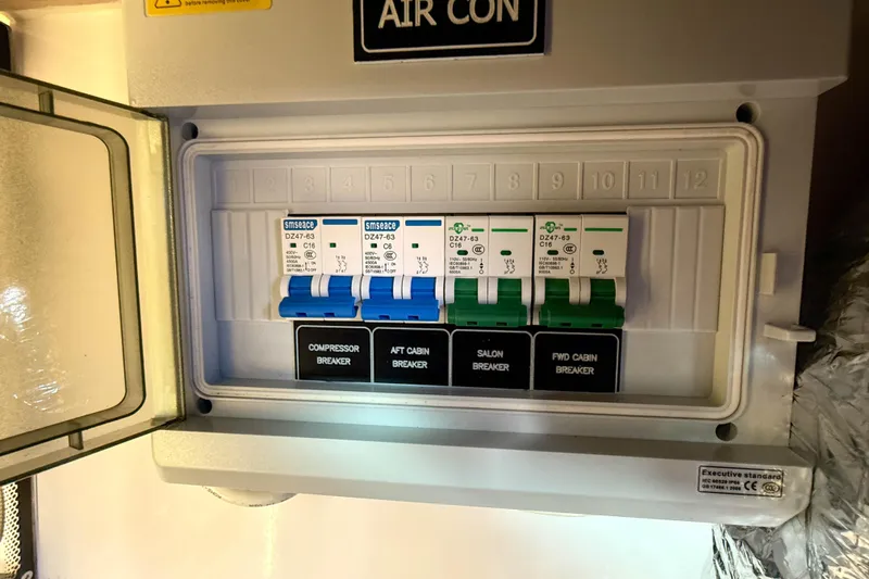 Slide: The Image of Electrical breaker panel on 2024 Axopar 45 XC Cross Cabin boat. - 46