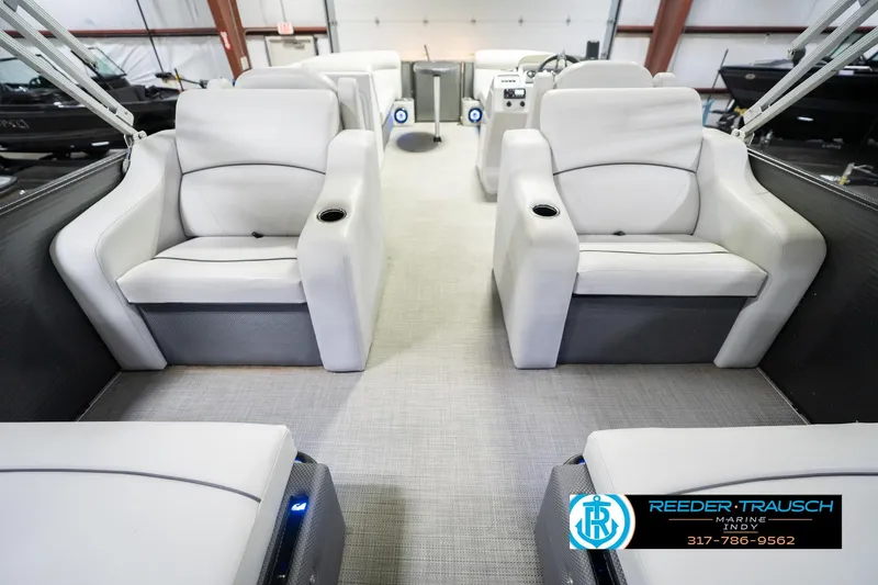 Slide: The Image of Interior of 2021 Crest SLRC 220 pontoon boat with plush seating and modern design. - 18