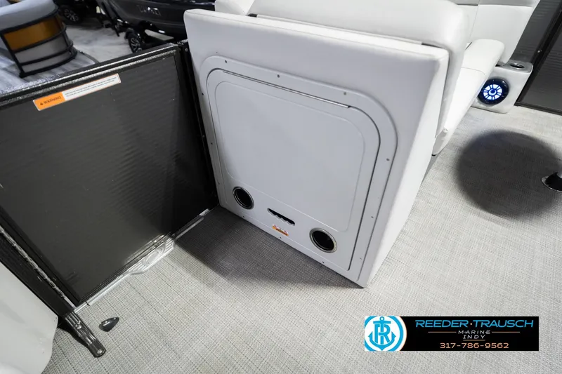 Slide: The Image of 2021 Crest SLRC 220 boat interior with seating and speaker system. - 25