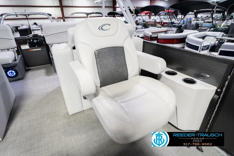 Slide: The Image of Luxury seating on 2021 Crest SLRC 220 pontoon boat with cup holders. - 28