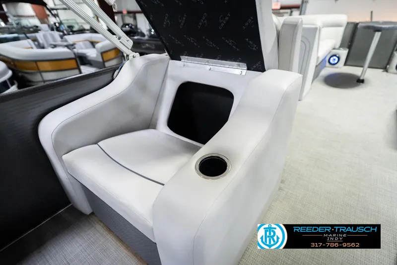 Slide: The Image of Crest SLRC 220 boat seat with cup holder, 2021 model, Reeder-Trausch Marine logo visible. - 30