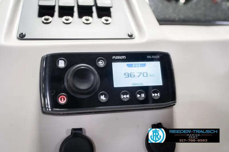 Slide: The Image of Fusion MS-RA55 radio on 2021 Crest SLRC 220 boat dashboard, displaying FM 96.70 MHz. - 38