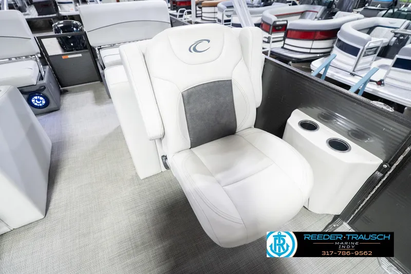 Slide: The Image of Luxury seating on 2021 Crest SLRC 220 boat with cup holders and modern design. - 48