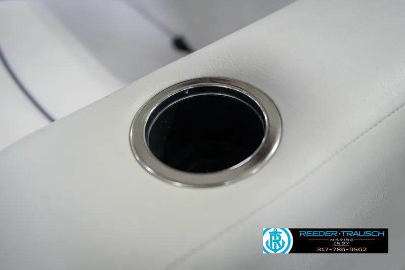 Slide: The Image of Cup holder on white leather seat of 2021 Crest SLRC 220 boat. - 51