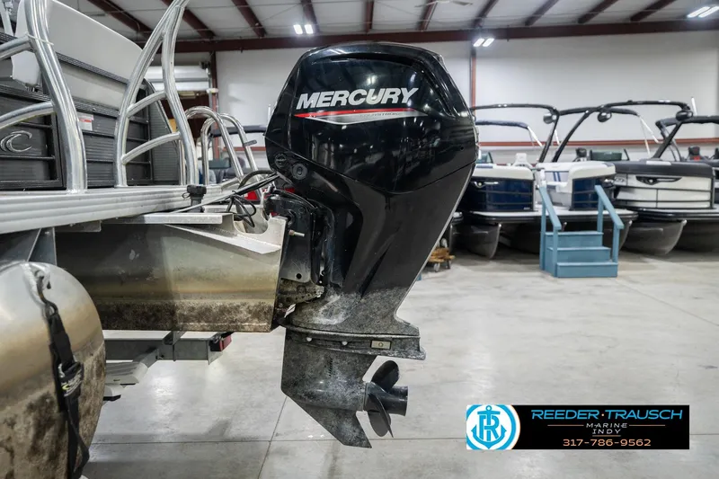 Slide: The Image of Crest SLRC 220 boat with Mercury outboard motor in showroom, 2021 model. - 53