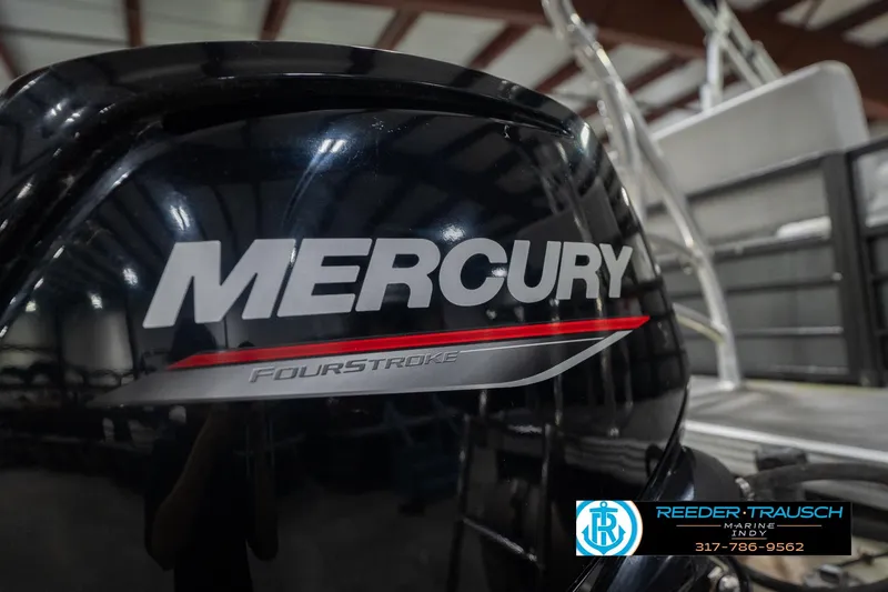 Slide: The Image of Mercury FourStroke engine on 2021 Crest SLRC 220 boat, Reeder-Trausch Marine logo visible. - 54