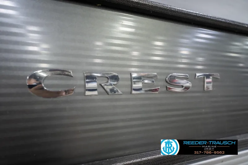 Slide: The Image of Crest SLRC 220 logo on metallic surface, 2021 model, Reeder-Trausch Marine branding. - 59