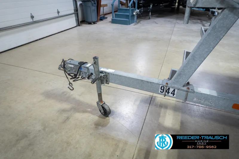 Slide: The Image of Trailer hitch with wheel in a garage, Crest SLRC 220, 2021 model. - 61