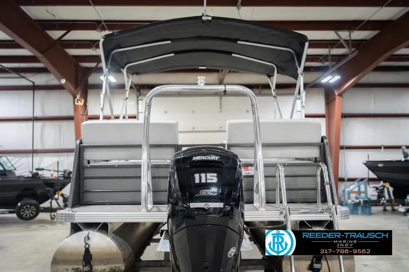 Slide: The Image of 2021 Crest SLRC 220 pontoon boat with Mercury 115 engine in a showroom. - 8