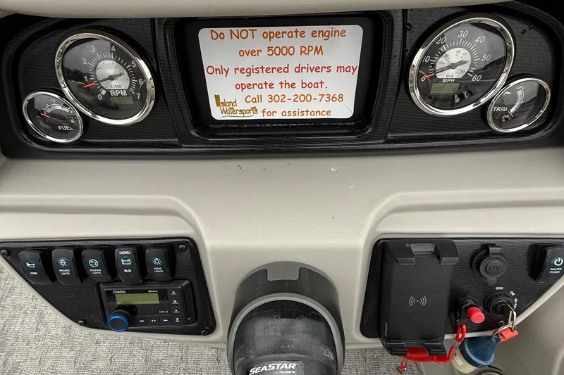 Slide: The Image of Dashboard of 2025 Berkshire 22RFX LE 2.75 boat with gauges and controls. - 13