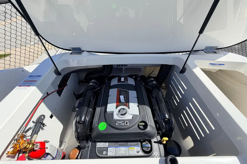 Slide: The Image of Engine compartment of 2026 Sea Ray SPX 210 boat, showcasing powerful 250 HP engine. - 15