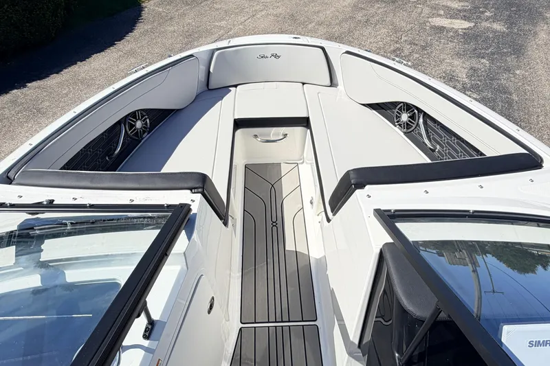 Slide: The Image of 2026 Sea Ray SPX 210 boat interior with sleek seating and modern design. - 18