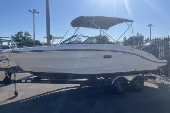 Slide: The Image of 2024 Sea Ray SPX 210 Outboard boat on trailer, side view, sunny day. - 4