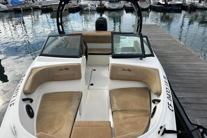 Slide: The Image of 2022 Sea Ray SPX 190 Outboard with Mercury engine in marina setting. - 14