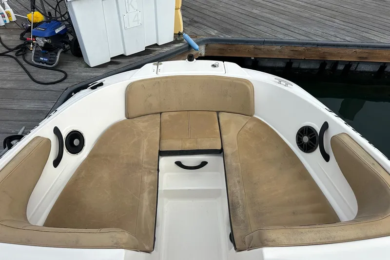 Slide: The Image of 2022 Sea Ray SPX 190 Outboard with Mercury engine, featuring tan seating and swim platform. - 15