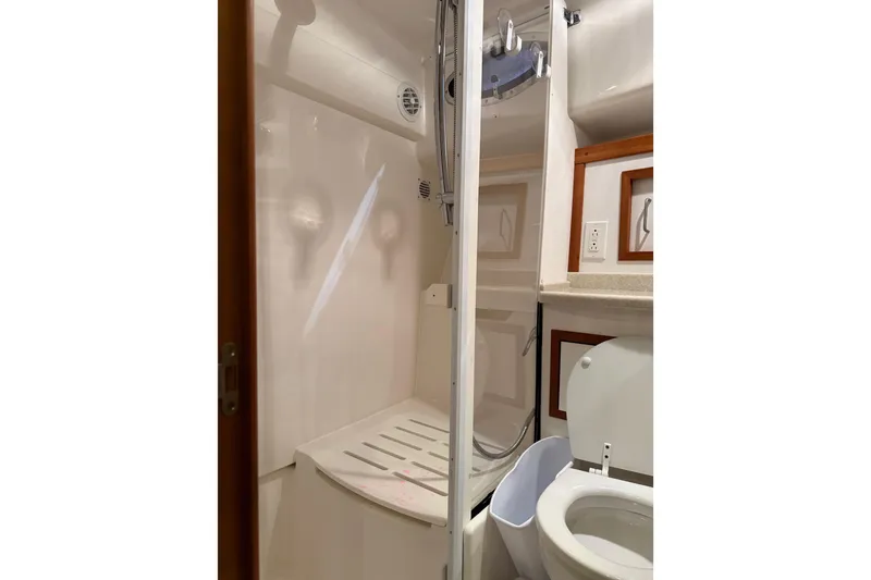 Slide: The Image of Bathroom interior of 2011 Back Cove 37 yacht with shower and toilet. - 15