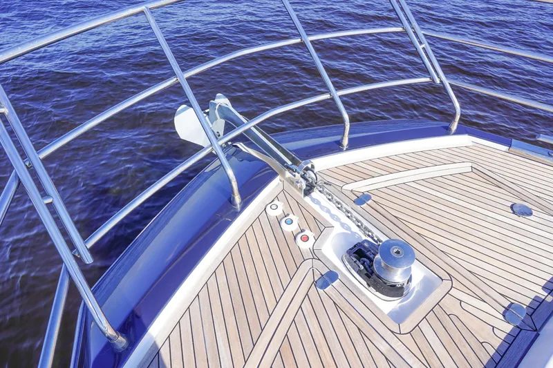 Slide: The Image of Bow of 2017 Azimut 66 Flybridge yacht with anchor and teak deck. - 19