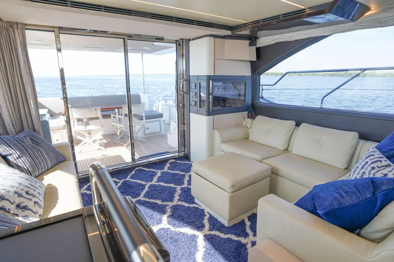 Slide: The Image of Luxurious interior of 2017 Azimut 66 Flybridge yacht with elegant seating and ocean view. - 21
