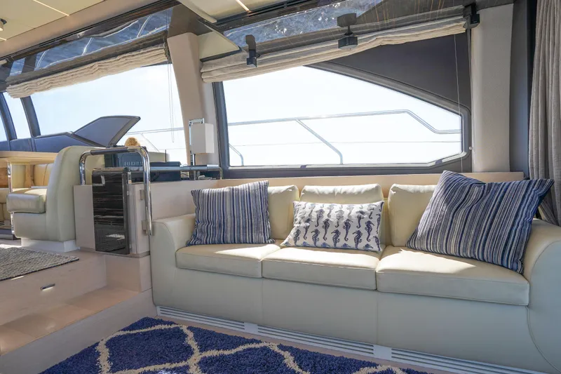 Slide: The Image of Luxurious interior of 2017 Azimut 66 Flybridge yacht with elegant seating and nautical decor. - 24