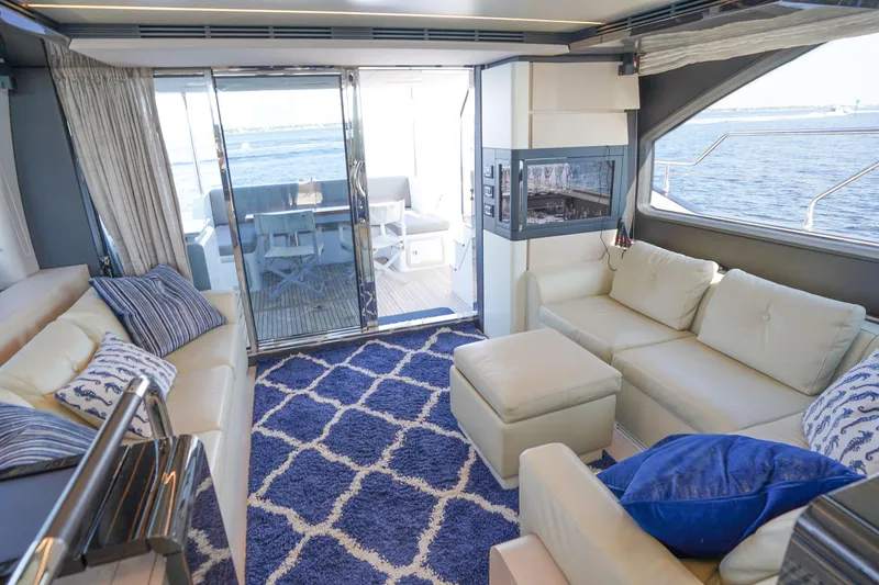 Slide: The Image of Luxurious interior of 2017 Azimut 66 Flybridge yacht with elegant seating and ocean view. - 25