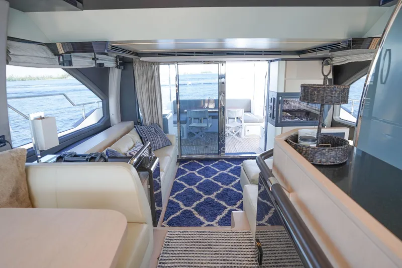 Slide: The Image of Luxurious interior of 2017 Azimut 66 Flybridge yacht with elegant seating and ocean view. - 26