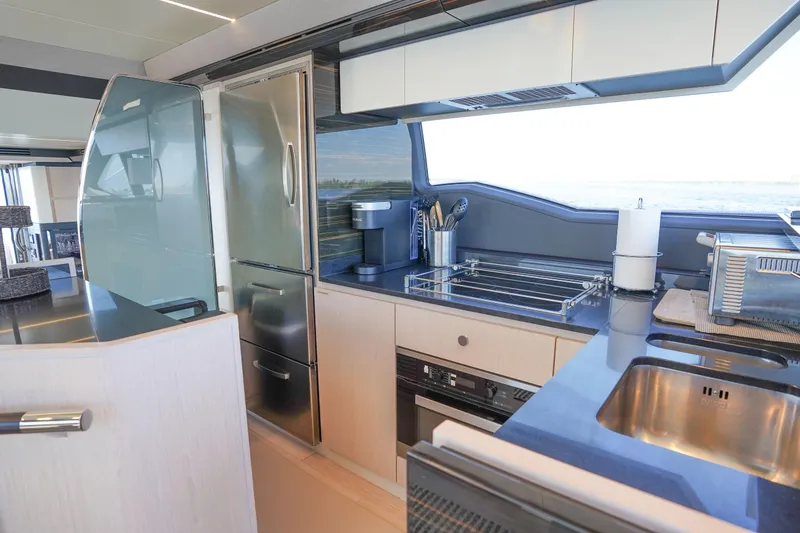 Slide: The Image of Luxurious kitchen interior of 2017 Azimut 66 Flybridge yacht with modern appliances. - 29