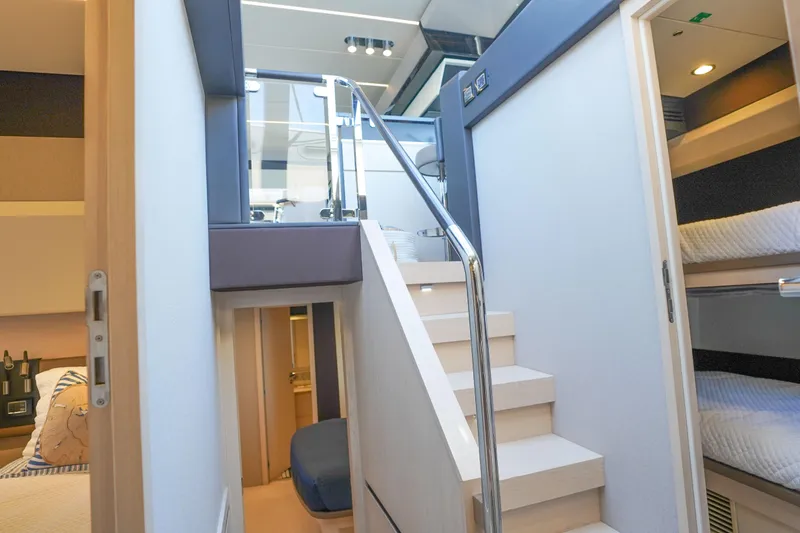 Slide: The Image of Interior of 2017 Azimut 66 Flybridge yacht with modern staircase and cozy cabins. - 37