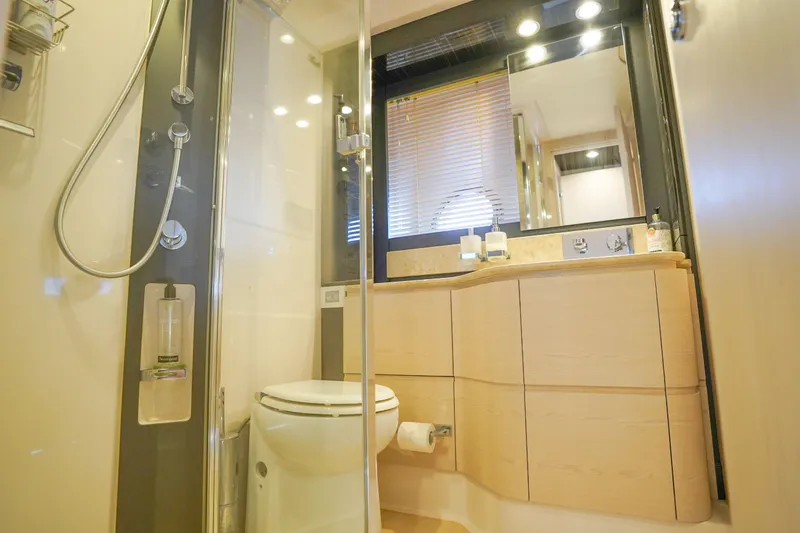 Slide: The Image of Luxurious bathroom in 2017 Azimut 66 Flybridge yacht with modern fixtures and elegant design. - 40
